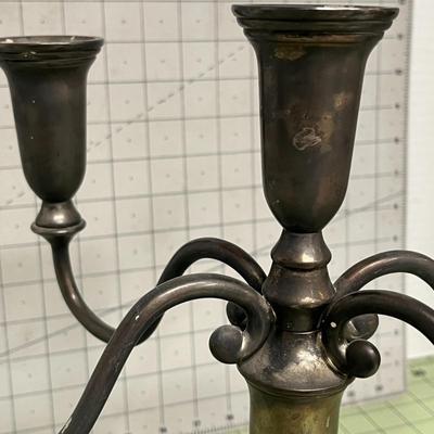 Sale Photo Thumbnail #26: Holds 5 standard taper candles and Likely silver-plated metal.