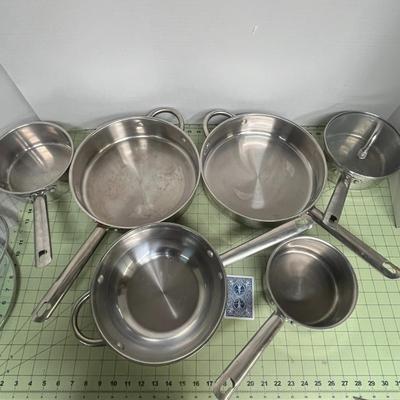 Sale Photo Thumbnail #71: Features: high-quality stainless steel construction for professional-grade cooking performance.