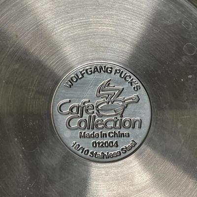 Sale Photo Thumbnail #73: Features: high-quality stainless steel construction for professional-grade cooking performance.