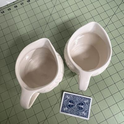 Sale Photo Thumbnail #169: Set of 2 Ceramic Pitchers with Embossed Olive Branch Design.