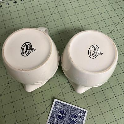 Sale Photo Thumbnail #170: Set of 2 Ceramic Pitchers with Embossed Olive Branch Design.