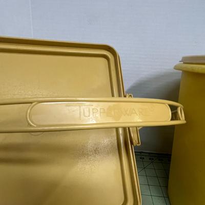 Sale Photo Thumbnail #191: Round Yellow Storage bin and a square lid with an integrated carry handle.