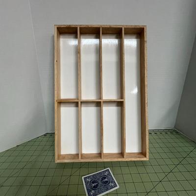 Sale Photo Thumbnail #196: Vertical Divider Display with White Backing and Natural wood Finish.