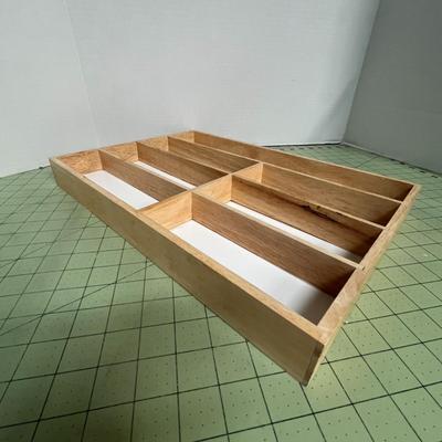Sale Photo Thumbnail #197: Vertical Divider Display with White Backing and Natural wood Finish.