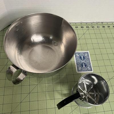 Sale Photo Thumbnail #219: Its Includes Large Handled Mixing Bowl and a Handheld Flour Sifter.