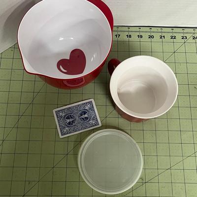 Sale Photo Thumbnail #290: Set Includes Red-and-White Plastic Mixing Bowl and Matching Red Handled Ceramic Storage Mug with Lid.