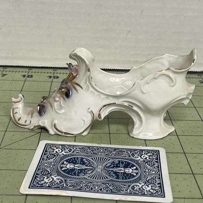 Sale Photo Thumbnail #359: Glazed fine porcelain with gold gilt highlights and hand-applied decorative elements.