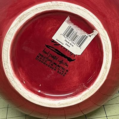 Sale Photo Thumbnail #397: Red ceramic pitcher with classic round-bellied shape.