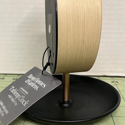Sale Photo Thumbnail #402: Round Wood Frame and Black Base.