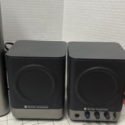 Sale Photo Thumbnail #602: 1 Subwoofer and 4 Satellite Speakers.