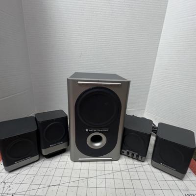 Sale Photo Thumbnail #599: 1 Subwoofer and 4 Satellite Speakers.