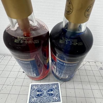 Sale Photo Thumbnail #614: Its Includes 1 Torani Cherry Syrup, 1 Torani Blue Raspberry Syrup & 2 Reusable Pump Dispensers.