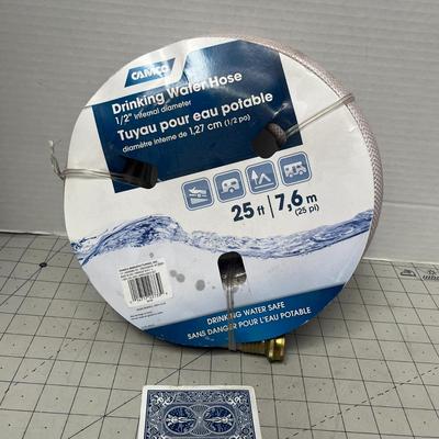 Sale Photo Thumbnail #702: Safe, flexible hose for RVs, boats, or outdoor potable water.