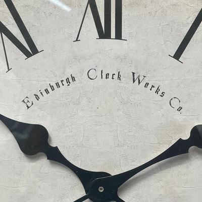 Sale Photo Thumbnail #706: Roman numeral clock with antique finish, perfect for décor.
