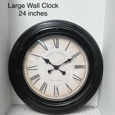Sale Photo Thumbnail #705: Roman numeral clock with antique finish, perfect for décor.