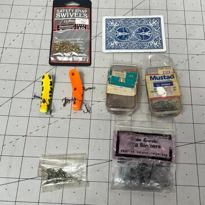 Sale Photo Thumbnail #779: Plano tackle box includes lures, hooks, swivels, sinkers, assorted sizes.