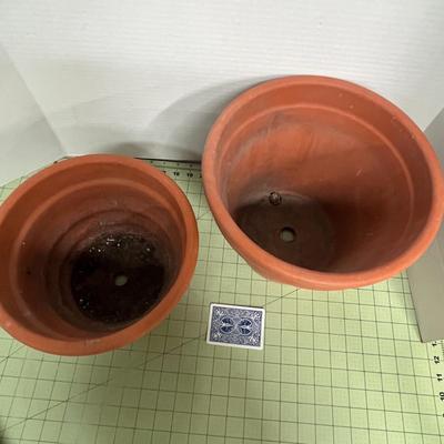 Sale Photo Thumbnail #796: Durable clay pots perfect for plants, flowers, herbs, or decor.