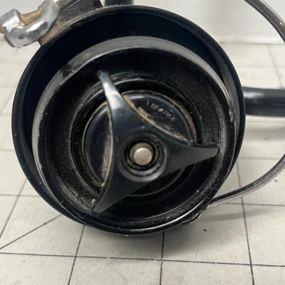 Sale Photo Thumbnail #829: Two vintage Mitchell spinning reels, durable graphite carbon spool design.