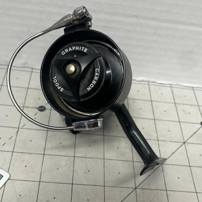 Sale Photo Thumbnail #825: Two vintage Mitchell spinning reels, durable graphite carbon spool design.