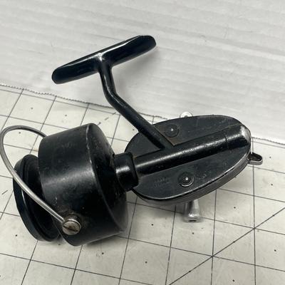 Sale Photo Thumbnail #830: Two vintage Mitchell spinning reels, durable graphite carbon spool design.