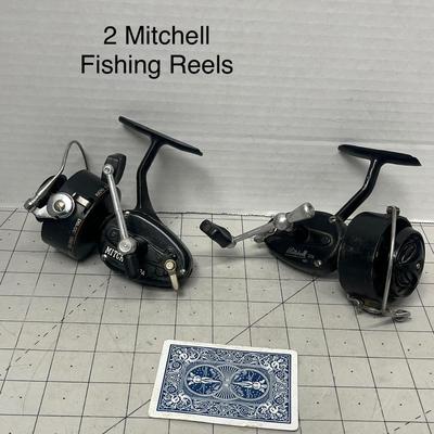 Sale Photo Thumbnail #822: Two vintage Mitchell spinning reels, durable graphite carbon spool design.