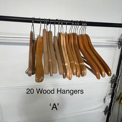 Sale Photo Thumbnail #836: Sturdy wood hangers for clothes, smooth finish, durable design.