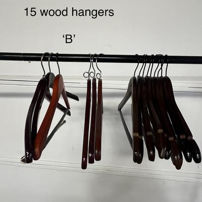 Sale Photo Thumbnail #883: Mixed wood hangers set, includes Macy’s and Nordstrom, size 43R.
