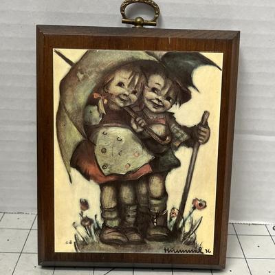 Sale Photo Thumbnail #899: Vintage Hummel prints in wood frames, charming collectible home decor.