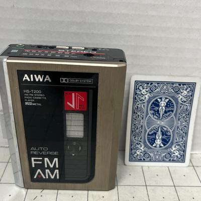 Sale Photo Thumbnail #906: Classic Aiwa cassette player with three TDK D90 blank tapes.
