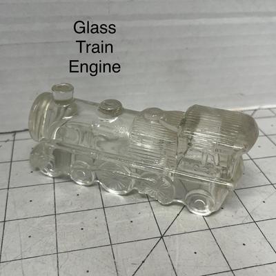 Sale Photo Thumbnail #935: Decorative clear glass train engine collectible, perfect vintage display piece.