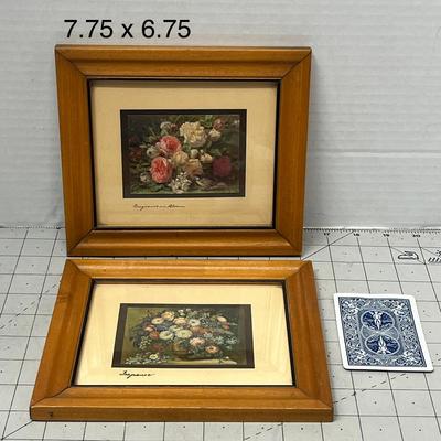 Sale Photo Thumbnail #965: Pair of vintage floral prints framed in natural wood.