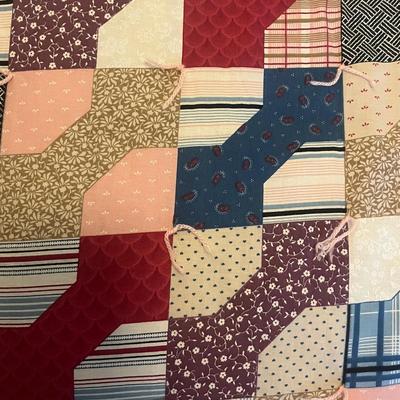 Sale Photo Thumbnail #1016: Colorful hand-tied quilt with classic geometric patterns