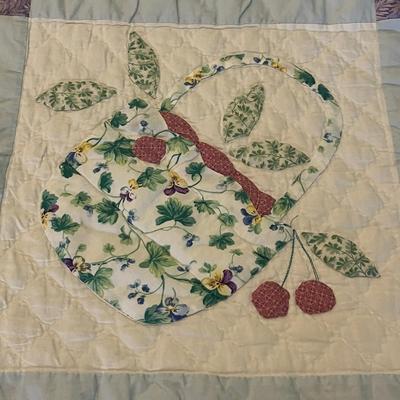 Sale Photo Thumbnail #1059: Handmade quilt with floral blocks and appliqué accents