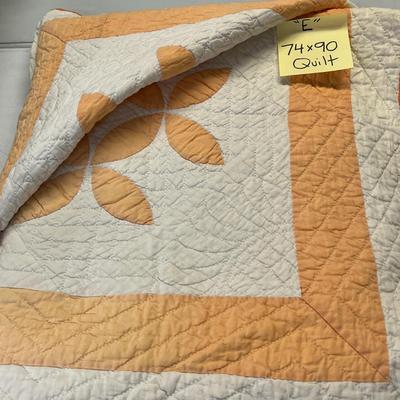 Sale Photo Thumbnail #1098: Hand-stitched quilt with peach appliqué flower design