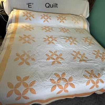Sale Photo Thumbnail #1100: Hand-stitched quilt with peach appliqué flower design