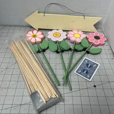 Sale Photo Thumbnail #1109: Flowers, sticks, bells, sign, and plastic sheets