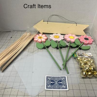 Sale Photo Thumbnail #1108: Flowers, sticks, bells, sign, and plastic sheets
