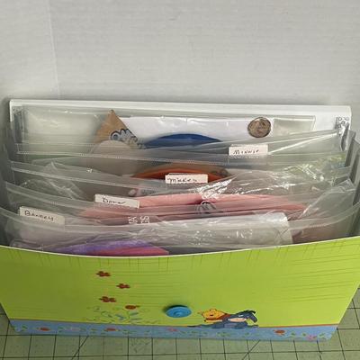 Sale Photo Thumbnail #1129: Includes folder with assorted cartoon iron-on appliqués