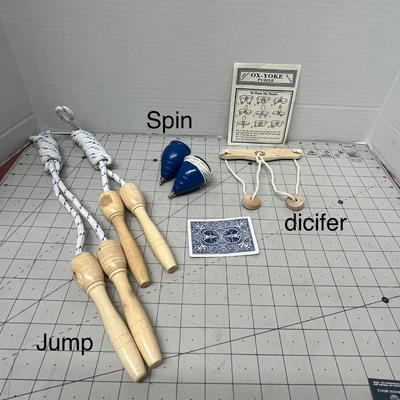 Sale Photo Thumbnail #1277: Jump rope, spinning tops, puzzle, string toy