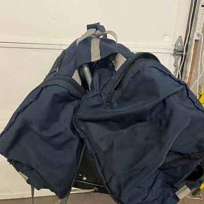 Sale Photo Thumbnail #1384: Spacious navy bag with zipper compartments, versatile carry