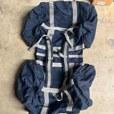 Sale Photo Thumbnail #1383: Spacious navy bag with zipper compartments, versatile carry