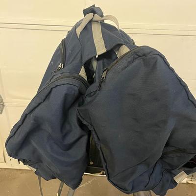 Sale Photo Thumbnail #1386: Spacious navy bag with zipper compartments, versatile carry