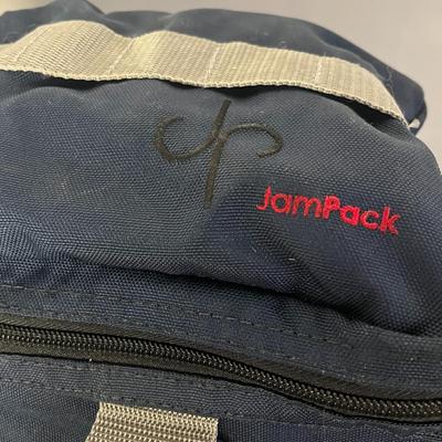 Sale Photo Thumbnail #1389: Spacious navy bag with zipper compartments, versatile carry