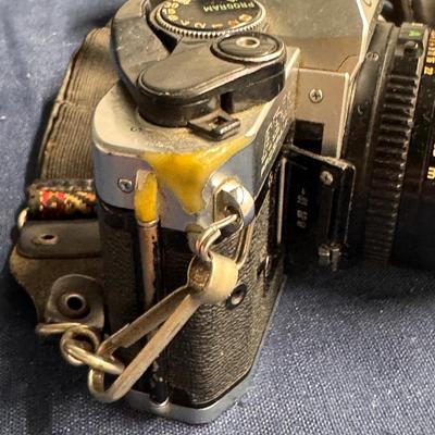 Canon AE1 Camera, lens, flash, and bag