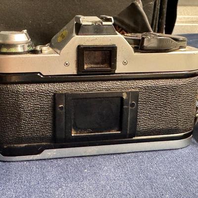 Canon AE1 Camera, lens, flash, and bag