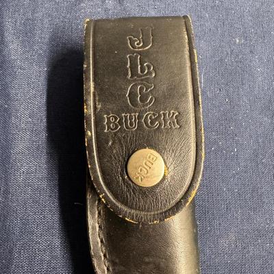 Buck fixed blade 121 hunting knife, with black sheath