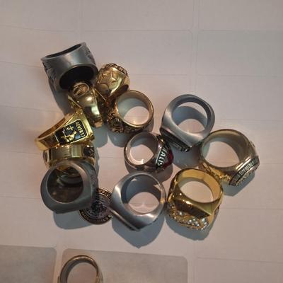 Sale Photo Thumbnail #565: This is a mixed lot. Most are size 10 but a few are smaller and at least 2 are larger.  They are all costume rings no gold or silver.