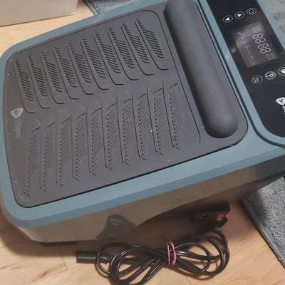 Sale Photo Thumbnail #10: Vibrates/ massages  for use while seated.  It is a small plate that vibrates and was intended to sit under a desk to help with lymphatic drainage, etc.)