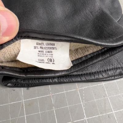 Sale Photo Thumbnail #680: Used. ! Is marked a size 8 other is a medium-ish Size. 