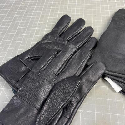 Sale Photo Thumbnail #682: Used. ! Is marked a size 8 other is a medium-ish Size. 